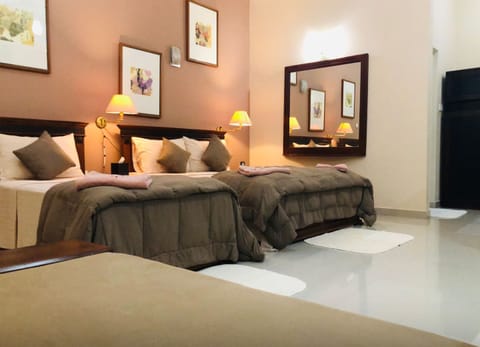 Deluxe Triple Room | 2 bedrooms, premium bedding, minibar, desk