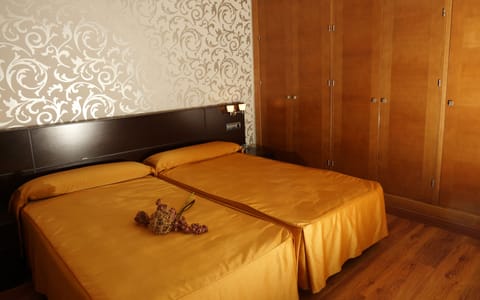 Double or Twin Room | Minibar, blackout drapes, soundproofing, free WiFi