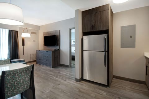 Suite, 2 Bedrooms | Private kitchen | Full-size fridge, microwave, stovetop, dishwasher