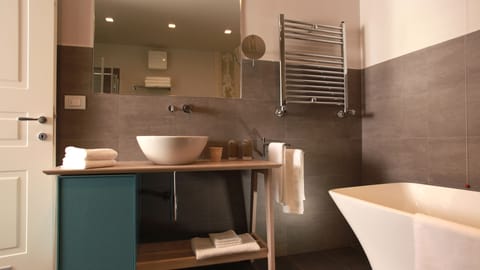 Junior Suite (4 Adults) | Bathroom | Free toiletries, hair dryer, bidet, towels