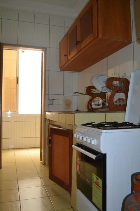 Apartment, 2 Bedrooms | Private kitchen | Full-size fridge, microwave, stovetop, coffee/tea maker