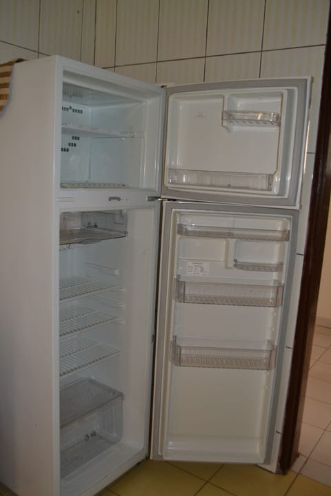 Apartment, 1 Bedroom | Private kitchen | Full-size fridge, microwave, stovetop, coffee/tea maker