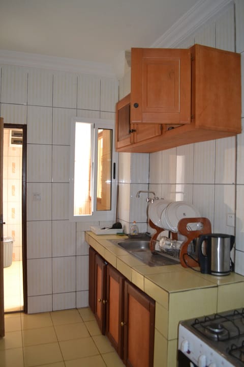 Apartment, 1 Bedroom | Private kitchen | Full-size fridge, microwave, stovetop, coffee/tea maker