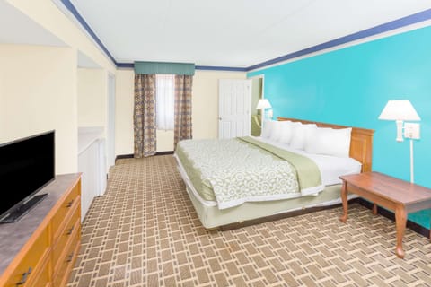 Suite, 1 King Bed, Non Smoking (One-Bedroom) | Desk, blackout drapes, iron/ironing board, free cribs/infant beds
