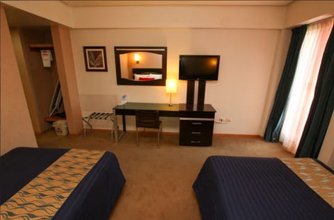 Executive Double Room | Down comforters, desk, blackout drapes, free WiFi