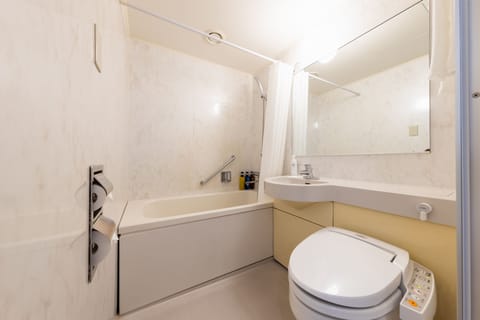 Combined shower/tub, deep soaking tub, hair dryer, slippers