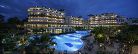 Indoor pool, seasonal outdoor pool, pool umbrellas, sun loungers