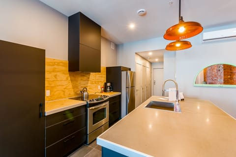 Penthouse Loft (T403) | Private kitchen | Full-size fridge, microwave, oven, stovetop