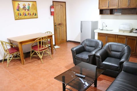 Condo, 1 Bedroom, Kitchen | Living area | 32-inch flat-screen TV with cable channels, LED TV