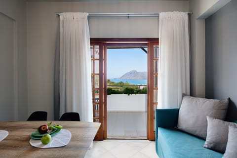 Apartment, 1 Bedroom, Sea View | Living area | Flat-screen TV