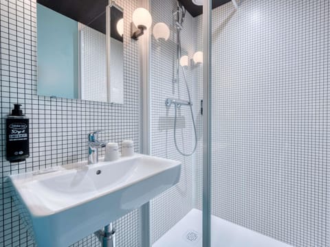 Premium bedding, desk, laptop workspace, blackout drapes