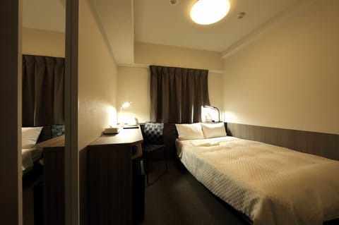 Standard Double Room | Down comforters, desk, blackout drapes, free WiFi