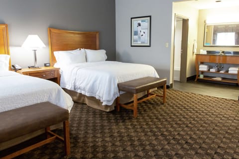 Suite, Two Queen Beds, Non-Smoking | Premium bedding, in-room safe, laptop workspace, blackout drapes