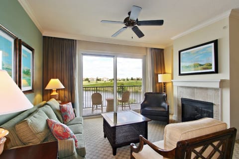 Club Suite, 1 King Bed | Living room | TV, DVD player