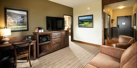 Premium bedding, desk, laptop workspace, iron/ironing board