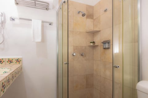 Standard Room, 1 King Bed | Bathroom | Shower, free toiletries, hair dryer, towels