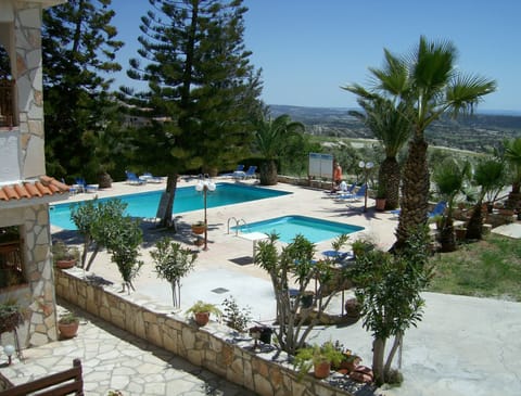 Apartment, 1 Bedroom | Pool | Seasonal outdoor pool, pool umbrellas, sun loungers