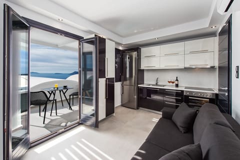 One-Bedroom Apartment, outdoor tub | Private kitchen | Full-size fridge, microwave, oven, dishwasher