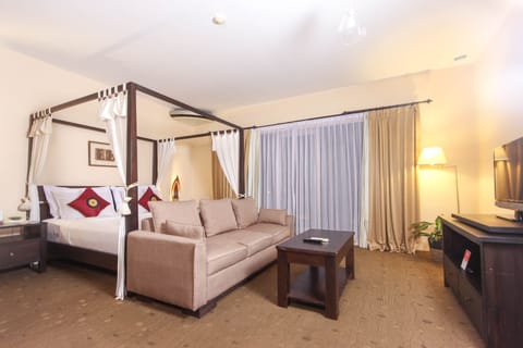 Junior Suite Village View | Minibar, individually decorated, individually furnished, desk