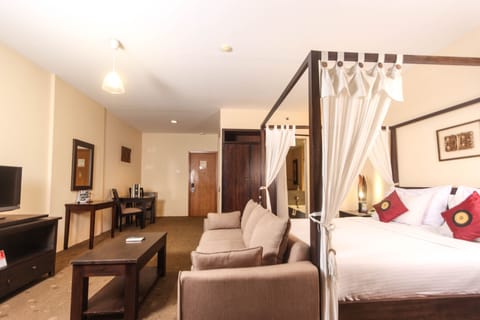 Junior Suite Village View | Minibar, individually decorated, individually furnished, desk