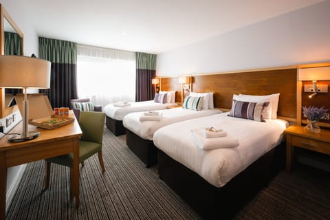 Standard Triple Room | In-room safe, desk, laptop workspace, blackout drapes