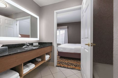 Suite, 1 King Bed, Non Smoking | Premium bedding, desk, iron/ironing board, free cribs/infant beds