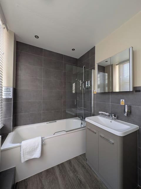 Standard Triple Room | In-room safe, desk, blackout drapes, iron/ironing board