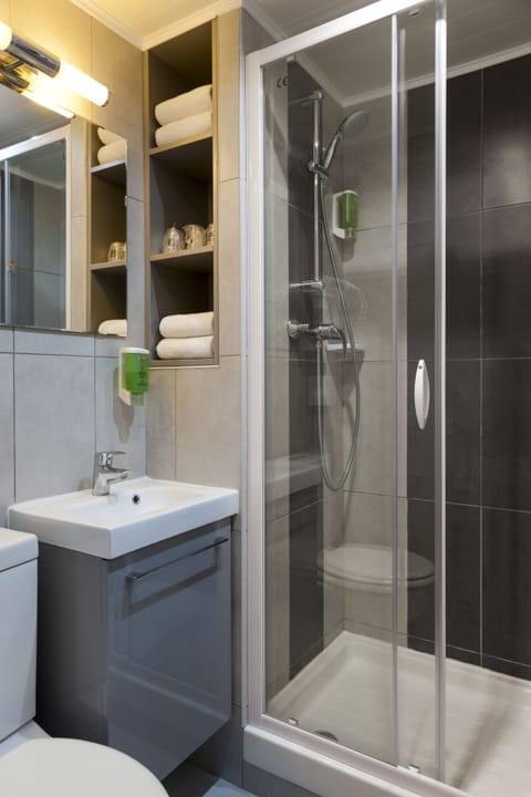 Shower, free toiletries, hair dryer, towels