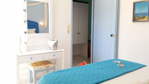 Superior Apartment, 1 Bedroom, Partial Sea View | In-room safe, soundproofing, iron/ironing board, free cribs/infant beds