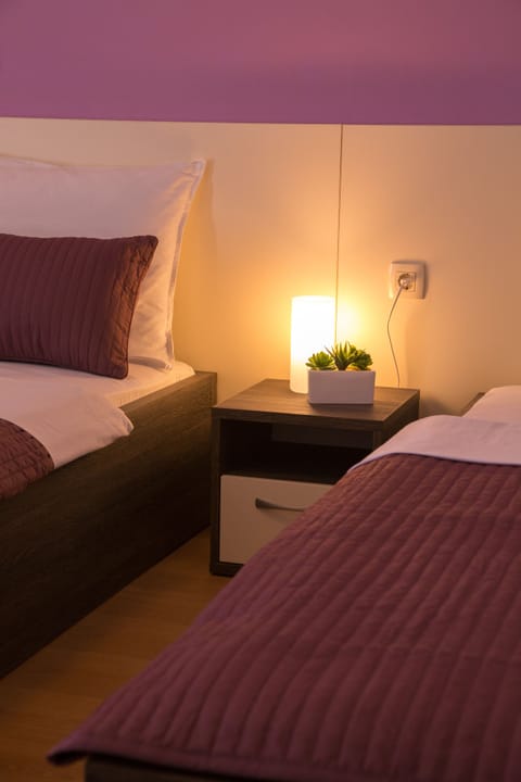 Quadruple Room, Balcony, Sea View | 8 bedrooms, premium bedding, minibar, blackout drapes