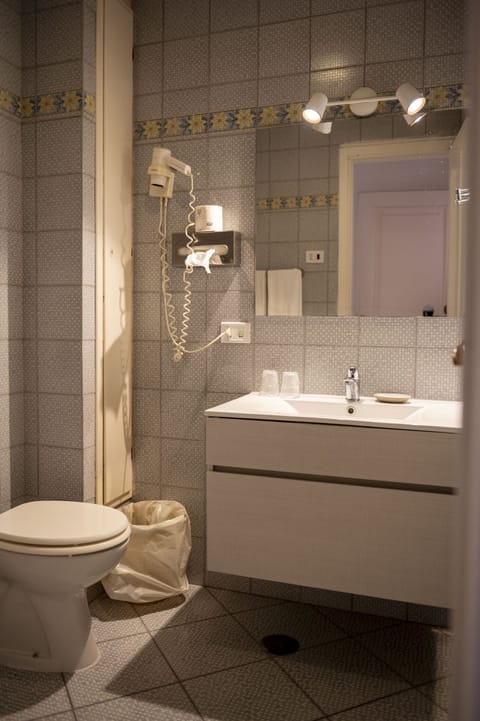 Apartment, 1 Bedroom | Bathroom | Combined shower/tub, deep soaking tub, free toiletries, hair dryer