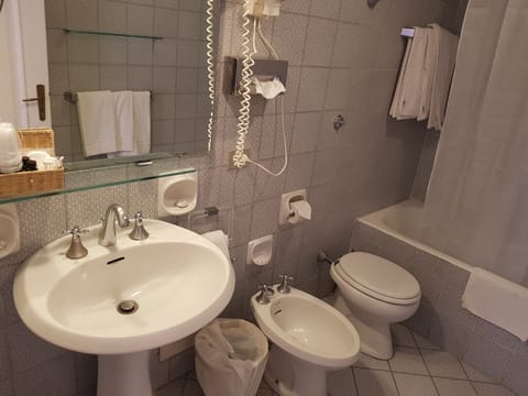 Apartment, 1 Bedroom | Bathroom | Combined shower/tub, deep soaking tub, free toiletries, hair dryer