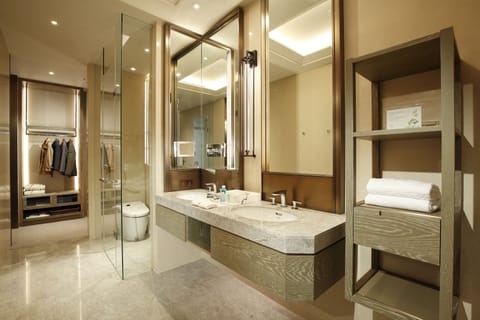 Separate tub and shower, hydromassage showerhead, designer toiletries