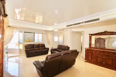 Family Apartment, 4 Bedrooms, Smoking, Sea Facing | Living room | 42-inch flat-screen TV with cable channels, TV
