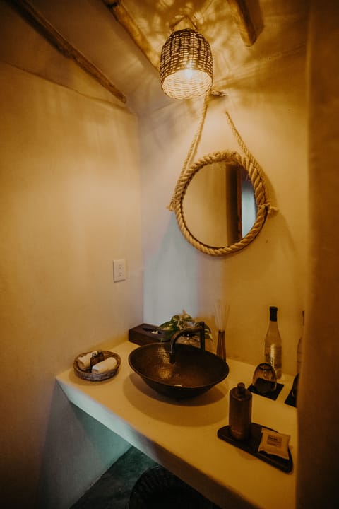 Casa Coco | Bathroom | Shower, rainfall showerhead, eco-friendly toiletries, hair dryer