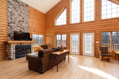 Luxury Cabin, 3 Bedrooms | Living area | 42-inch TV with cable channels