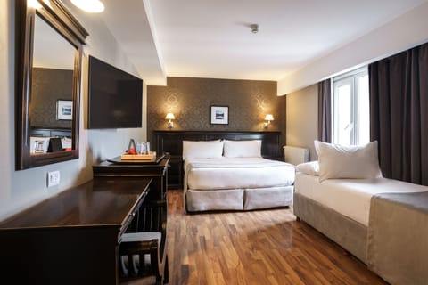 Luxury Triple Room | Premium bedding, down comforters, Select Comfort beds, minibar