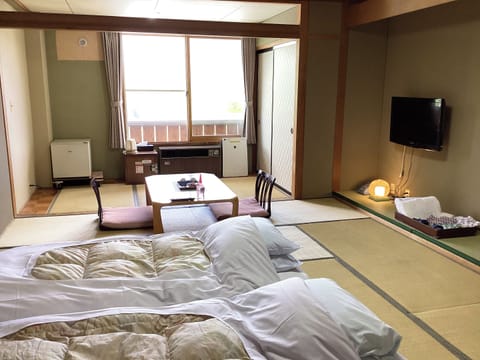 Traditional Twin Room, City View | In-room safe, blackout drapes, soundproofing, free WiFi