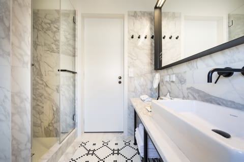 Atelier | Bathroom | Shower, rainfall showerhead, designer toiletries, hair dryer