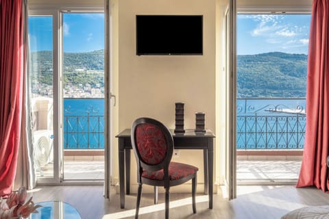 Superior Suite with Sea View | Desk, blackout drapes, iron/ironing board, free WiFi