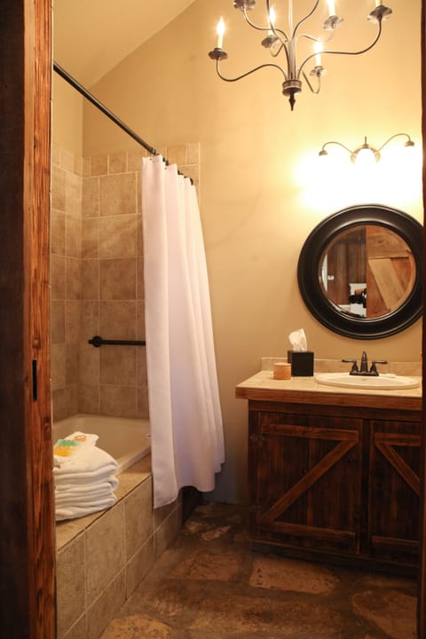 Bluebonnet | Bathroom | Designer toiletries, hair dryer, towels, soap