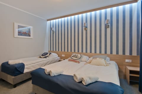 Triple Room | Premium bedding, desk, soundproofing, cribs/infant beds