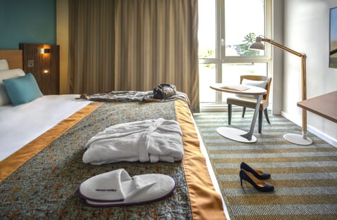 Premium bedding, Select Comfort beds, desk, blackout drapes