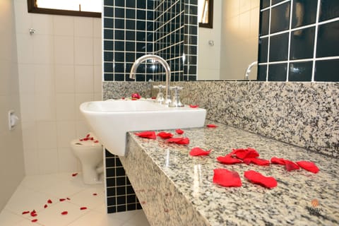 Luxury Suite, Bathtub | Bathroom | Shower, free toiletries, hair dryer, towels