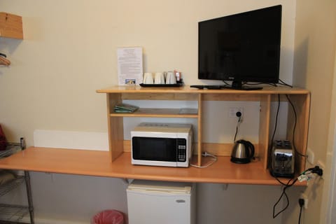 Economy Twin or Triple Room | Minibar, iron/ironing board, free WiFi, bed sheets