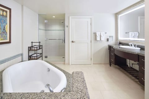 Separate tub and shower, deep soaking tub, designer toiletries