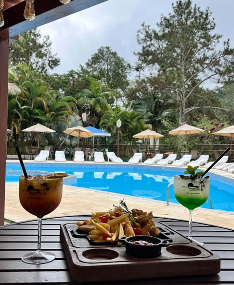 Indoor pool, outdoor pool, pool umbrellas, sun loungers