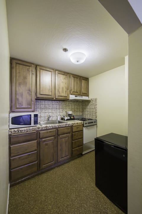 Superior Suite, 2 Bedrooms | Private kitchen | Fridge, coffee/tea maker