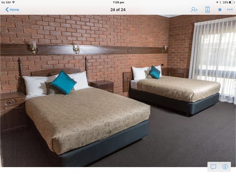 Deluxe Room, Kitchenette (Deluxe Twin) | Desk, iron/ironing board, free WiFi, bed sheets