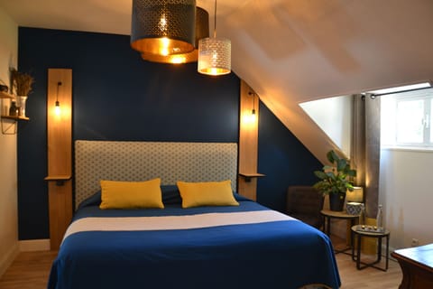 Family Quadruple Room, 2 Bedrooms | Minibar, in-room safe, individually decorated, desk